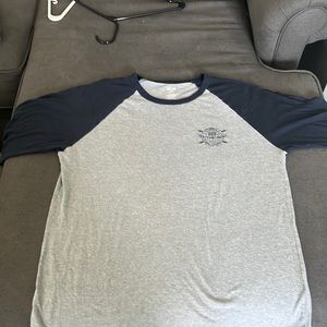 Grey and blue vans shirt in good condition with baseball style sleeves
